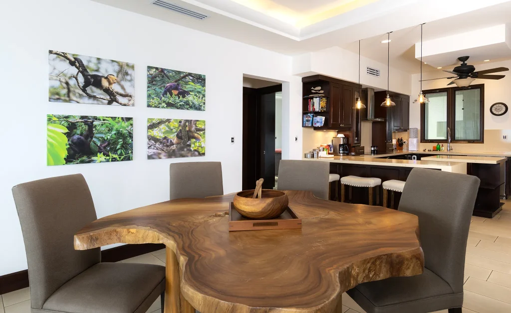 Dining area at 360 Splendor with a live-edge wood table.