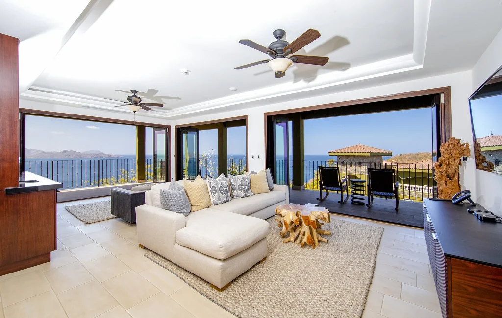 Open-concept living room at 360 Splendor opening to the ocean view.