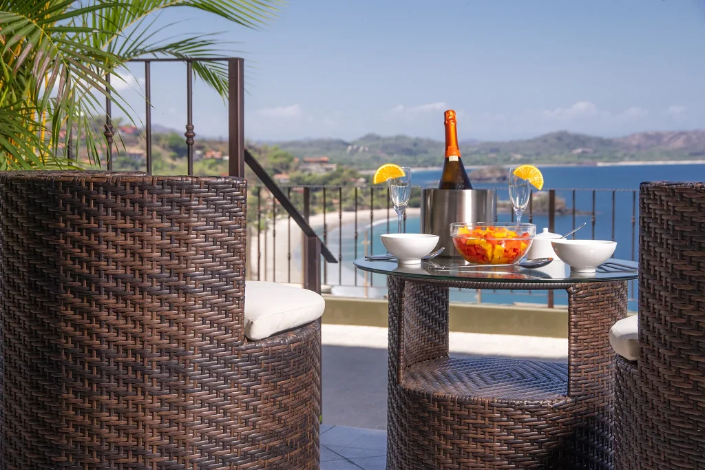 Fresh fruit and sparkling wine on the terrace at 360 Splendor overlooking the bay.