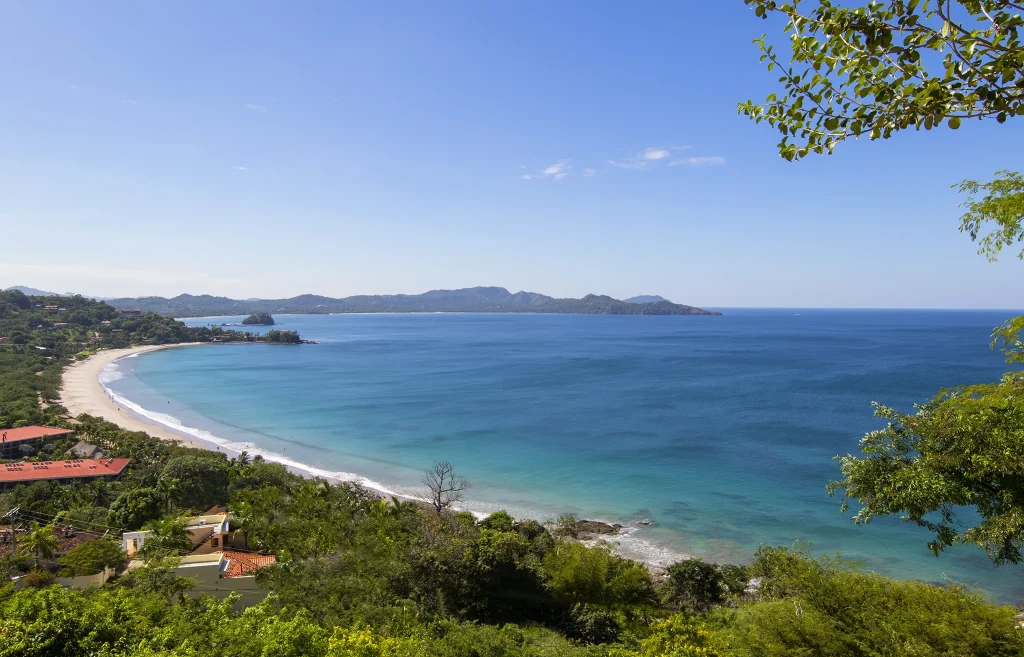 View of Playa Flamingo's beach crescent and bay from 360 Splendor.