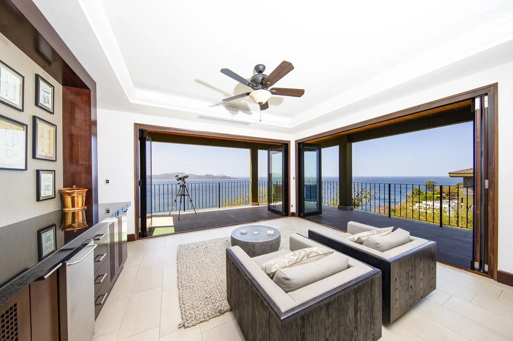 360 Splendor living room opening onto an ocean-view terrace, Flamingo Beach, Costa Rica